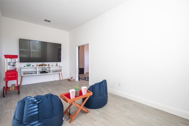 121 Black Talon Ln, Cedar Creek, TX 78612 - living area with wood finished floors and baseboards