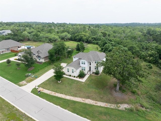 121 Black Talon Ln, Cedar Creek, TX 78612 - view from above of property with a heavily wooded area