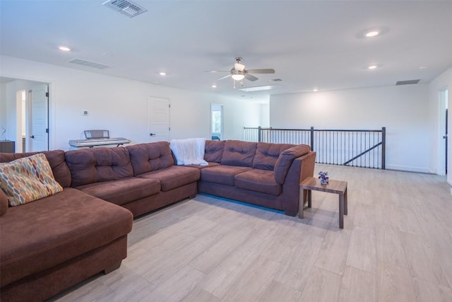 121 Black Talon Ln, Cedar Creek, TX 78612 - living area with light wood-style flooring, ceiling fan, and recessed lighting