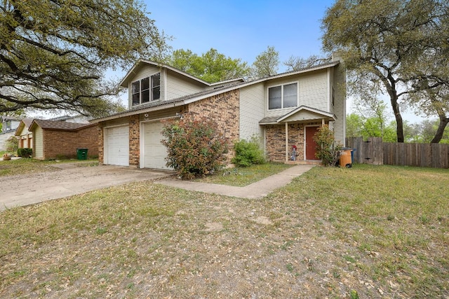 view of front facade featuring fence, a garage, concrete driveway, a front yard, and brick siding