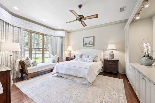 807 Terrace Mountain Dr, West Lake Hills, TX 78746 - bedroom with ornamental molding, dark wood finished floors, ceiling fan, and visible vents