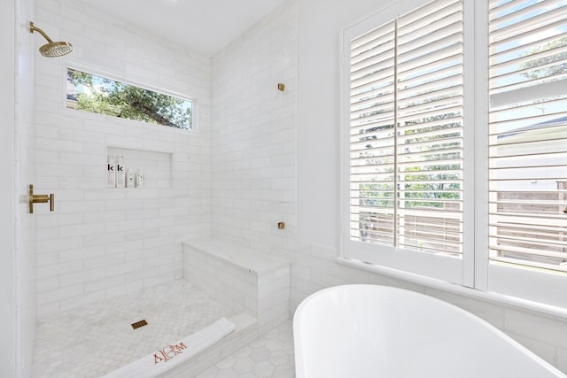 807 Terrace Mountain Dr, West Lake Hills, TX 78746 - bathroom with plenty of natural light, a soaking tub, and a shower stall
