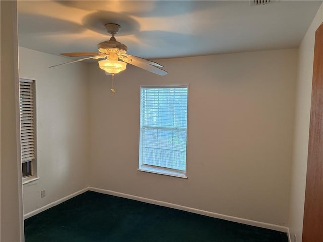 6300 Hickman Ave, Austin, TX 78723 - unfurnished room featuring a ceiling fan and dark colored carpet