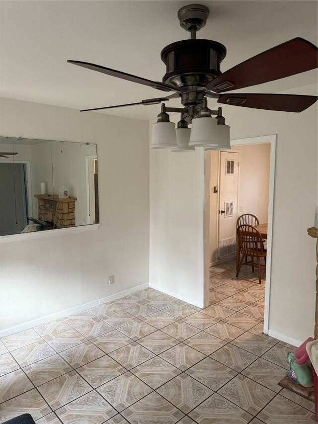 6300 Hickman Ave, Austin, TX 78723 - spare room featuring ceiling fan and light tile patterned flooring