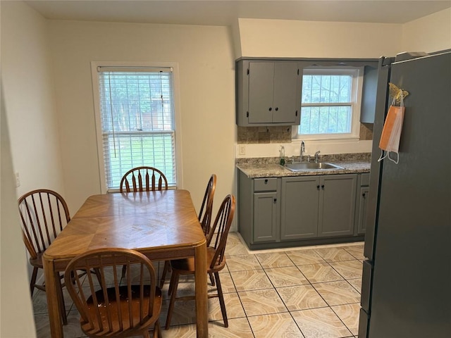 6300 Hickman Ave, Austin, TX 78723 - dining area with light tile patterned floors