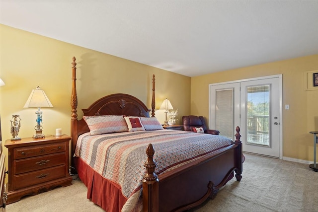 317 Venture Blvd S, Point Venture, TX 78645 - bedroom with access to exterior and light colored carpet