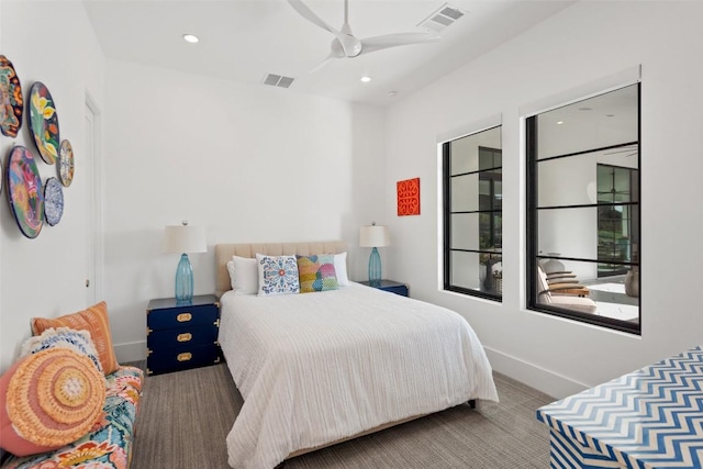 carpeted bedroom with baseboards, a ceiling fan, visible vents, and recessed lighting