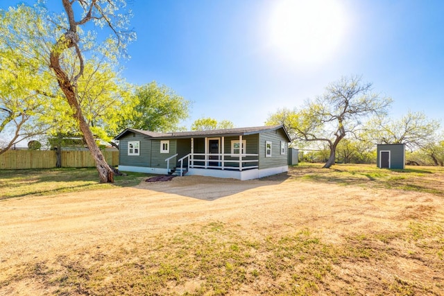 4904 Fm 2984, Luling, TX 78648 - rear view of house with dirt driveway