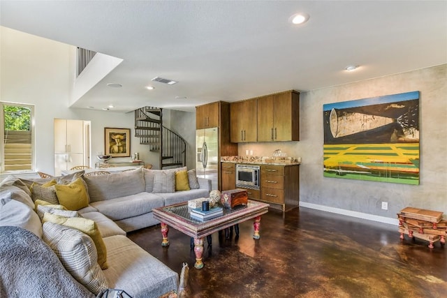 5802 Gentle Breeze Ter, Austin, TX 78731 - living room with stairway, concrete flooring, and recessed lighting
