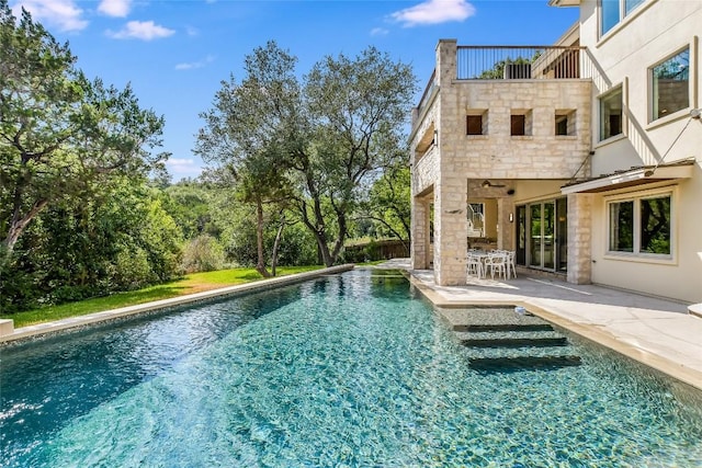 5802 Gentle Breeze Ter, Austin, TX 78731 - swimming pool featuring a patio