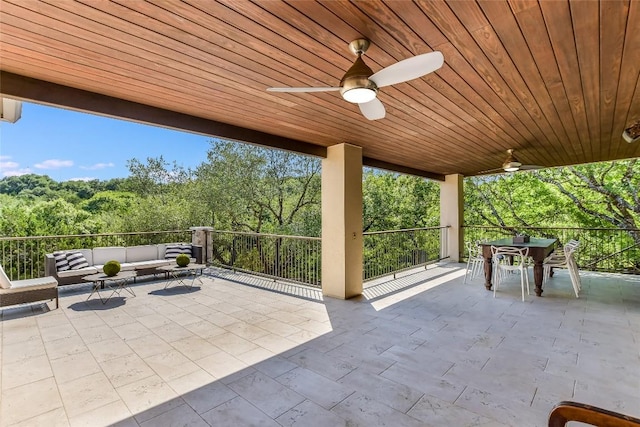 5802 Gentle Breeze Ter, Austin, TX 78731 - view of patio featuring outdoor lounge area, a ceiling fan, outdoor dining space, and a view of trees