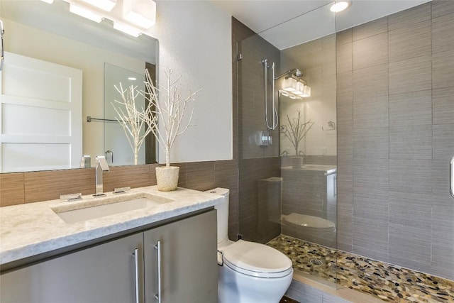 5802 Gentle Breeze Ter, Austin, TX 78731 - full bath featuring vanity, walk in shower, and tile walls