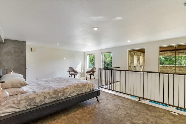 5802 Gentle Breeze Ter, Austin, TX 78731 - bedroom featuring carpet floors, multiple windows, and recessed lighting