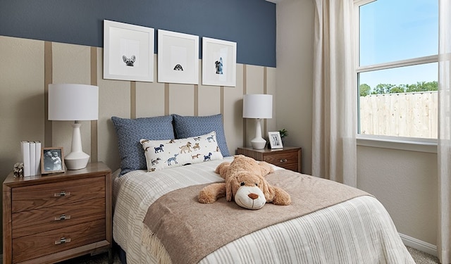 513 Raleigh Dr, Georgetown, TX 78633 - carpeted bedroom featuring baseboards