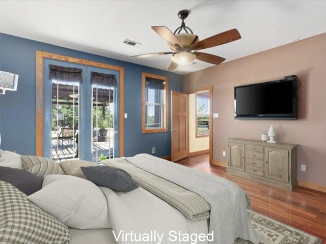 650 Farris Ranch Rd, Georgetown, TX 78633 - bedroom with access to outside, wood finished floors, baseboards, and a ceiling fan