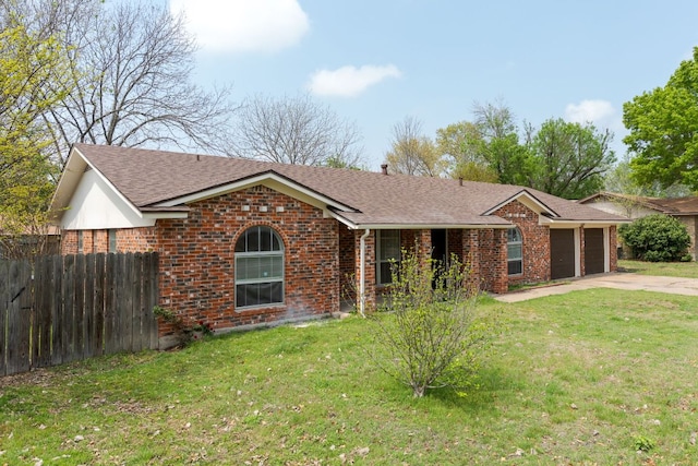 ranch-style home with an attached garage, brick siding, fence, and concrete driveway
