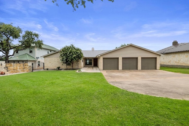 209 Senisa Dr, Buchanan Dam, TX 78609 - view of front of property featuring driveway, fence, an attached garage, a front lawn, and metal roof