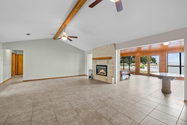 209 Senisa Dr, Buchanan Dam, TX 78609 - unfurnished living room featuring baseboards, vaulted ceiling with beams, visible vents, and a ceiling fan