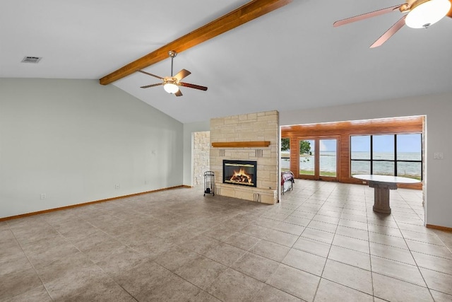 209 Senisa Dr, Buchanan Dam, TX 78609 - unfurnished living room with visible vents, lofted ceiling with beams, baseboards, and ceiling fan