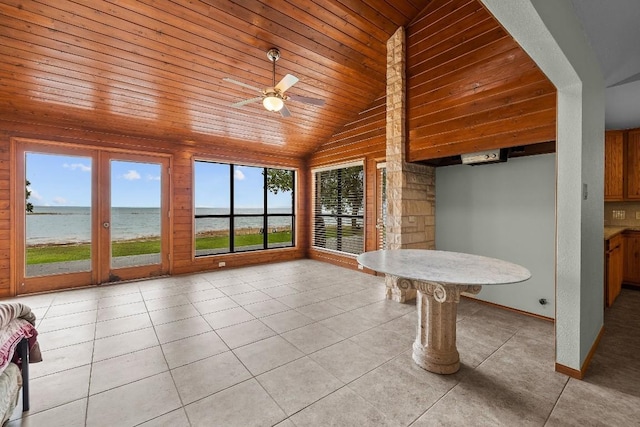 209 Senisa Dr, Buchanan Dam, TX 78609 - interior space with wooden ceiling, a ceiling fan, lofted ceiling, light tile patterned floors, and baseboards