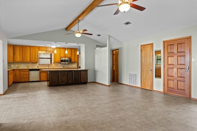 209 Senisa Dr, Buchanan Dam, TX 78609 - kitchen with stainless steel microwave, dishwashing machine, a ceiling fan, and visible vents