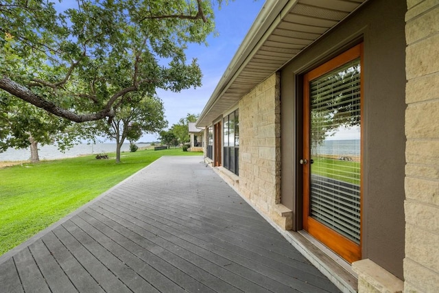 209 Senisa Dr, Buchanan Dam, TX 78609 - wooden terrace featuring a lawn