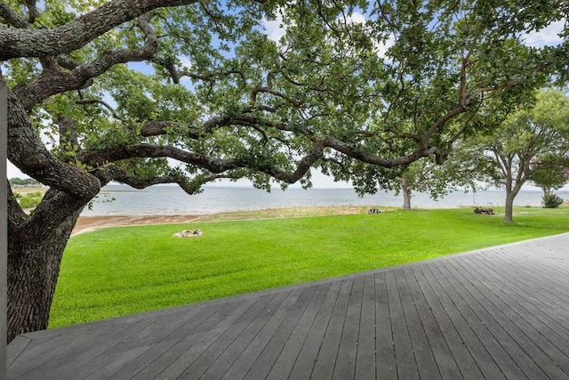 209 Senisa Dr, Buchanan Dam, TX 78609 - wooden terrace with a water view and a lawn