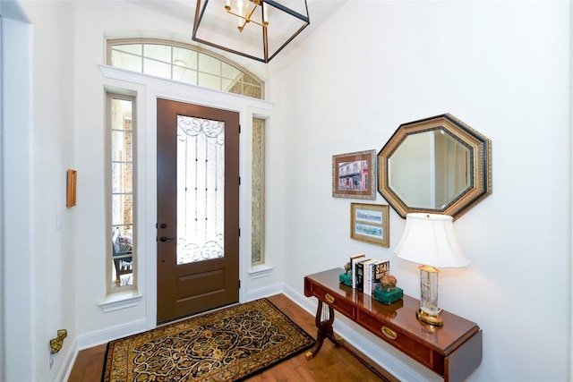 5314 Tribolo Trl, Round Rock, TX 78665 - foyer featuring wood finished floors and a chandelier