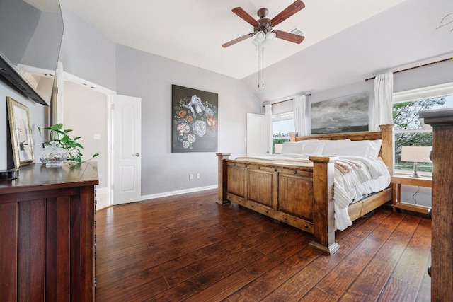 105 Wimberley St, Hutto, TX 78634 - bedroom featuring dark wood-style floors, vaulted ceiling, baseboards, and ceiling fan
