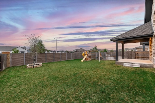 1017 Dog Iron St, Georgetown, TX 78633 - fenced backyard with a playground