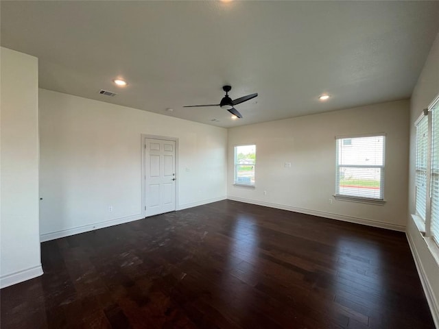 2105 Tiger Trl Unit 501, Round Rock, TX 78665 - unfurnished room with dark wood-style floors, baseboards, and visible vents