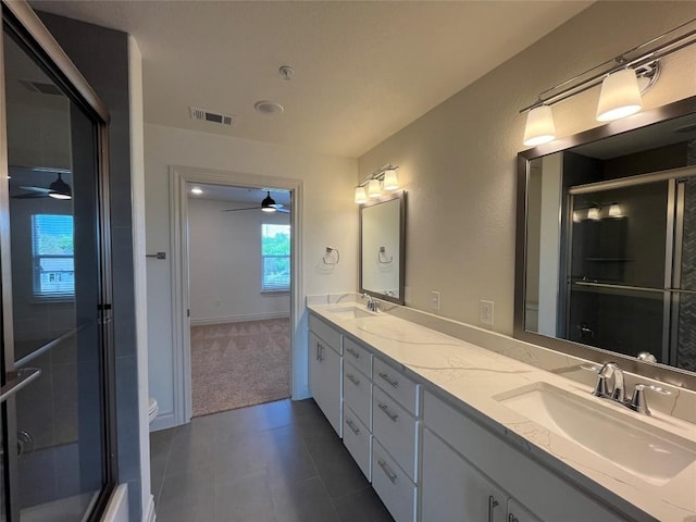 2105 Tiger Trl Unit 501, Round Rock, TX 78665 - full bathroom with double vanity, a sink, ceiling fan, and visible vents