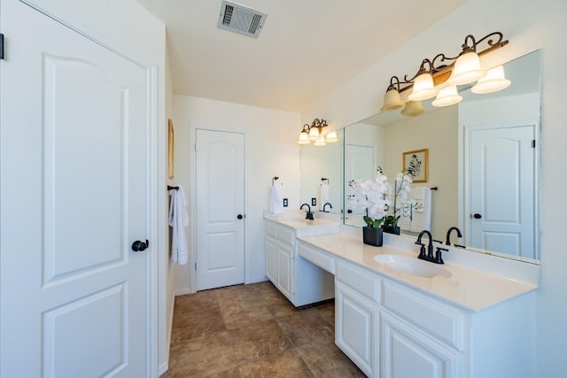 7724 Yaupon Dr, Austin, TX 78759 - full bathroom featuring double vanity and stone finish flooring