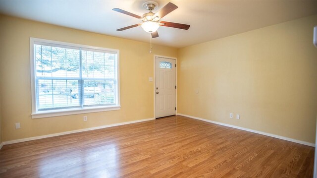2312 Devonshire Dr, Austin, TX 78723 - unfurnished room with a ceiling fan and wood finished floors
