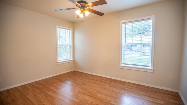 2312 Devonshire Dr, Austin, TX 78723 - empty room featuring wood finished floors and a ceiling fan