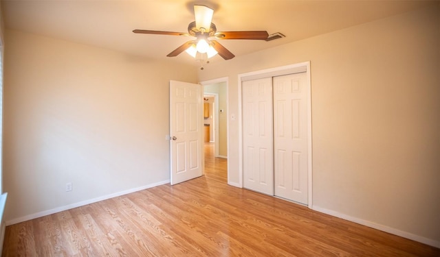 2312 Devonshire Dr, Austin, TX 78723 - unfurnished bedroom featuring light wood-style flooring, a closet, and a ceiling fan