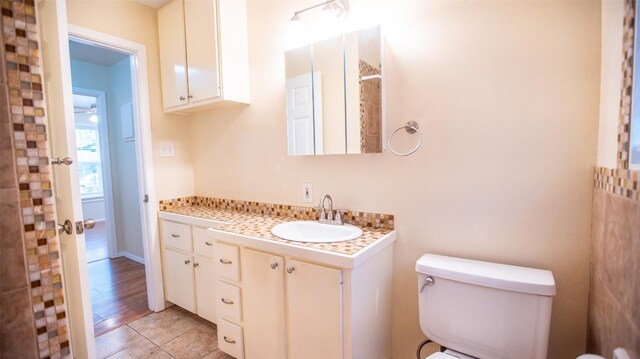 2312 Devonshire Dr, Austin, TX 78723 - full bathroom featuring toilet and vanity