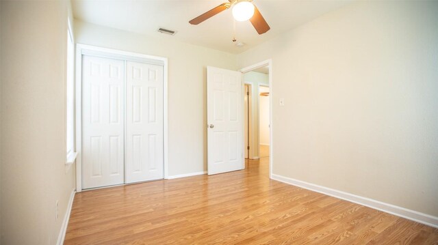 2312 Devonshire Dr, Austin, TX 78723 - unfurnished bedroom with light wood-style floors, a closet, and ceiling fan