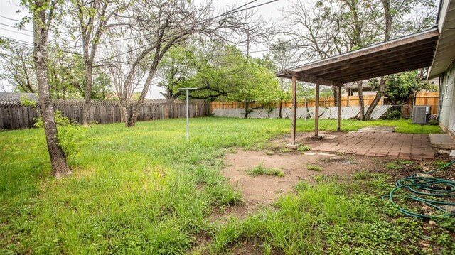 2312 Devonshire Dr, Austin, TX 78723 - fenced backyard featuring a patio area