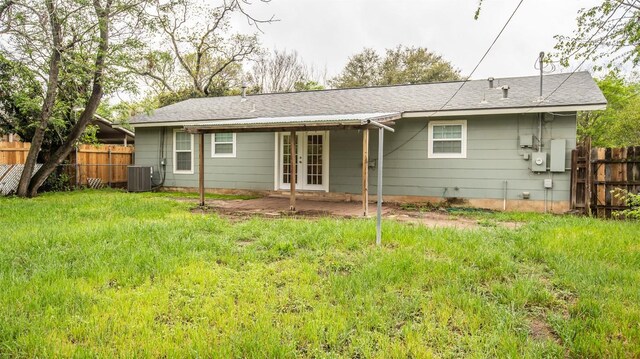 2312 Devonshire Dr, Austin, TX 78723 - rear view of house with french doors and a patio area