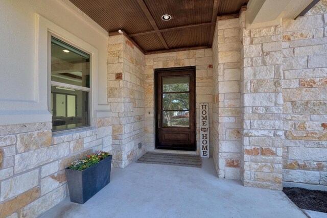 6109 Destination Way, Lago Vista, TX 78645 - property entrance featuring stone siding