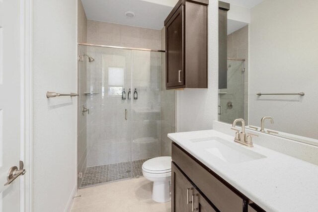 6109 Destination Way, Lago Vista, TX 78645 - full bath featuring vanity, a stall shower, and tile patterned floors