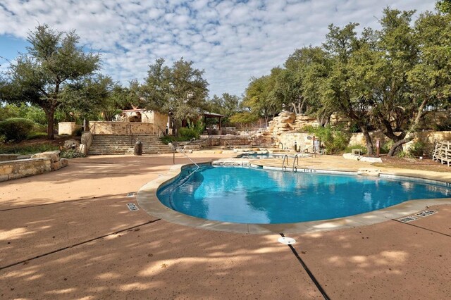 6109 Destination Way, Lago Vista, TX 78645 - community pool featuring a patio area