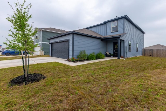 12305 Zenyatta Dr, Buda, TX 78610 - traditional home with fence, an attached garage, concrete driveway, and a front lawn
