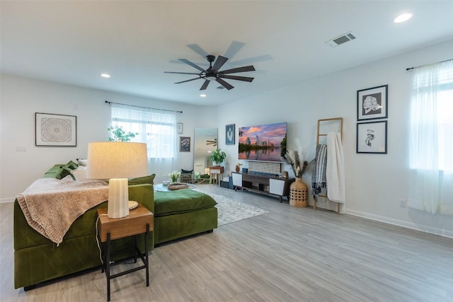 12305 Zenyatta Dr, Buda, TX 78610 - living area featuring ceiling fan, recessed lighting, light wood-style flooring, and visible vents