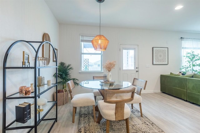 12305 Zenyatta Dr, Buda, TX 78610 - dining space with recessed lighting, light wood-type flooring, and a wealth of natural light