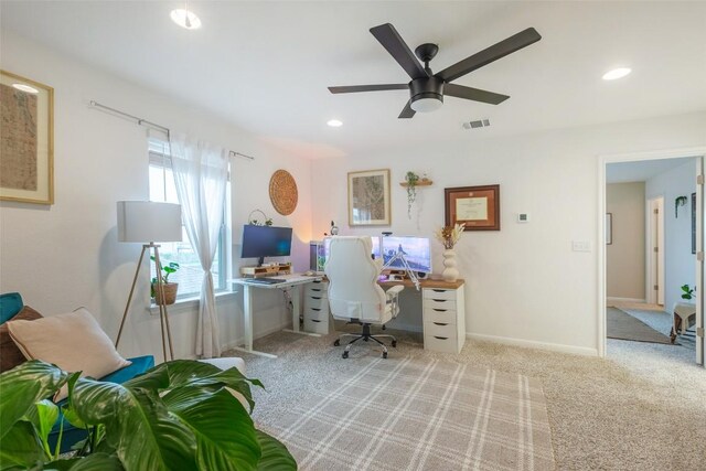 carpeted office space with baseboards, ceiling fan, recessed lighting, and visible vents