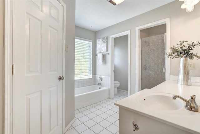 591 Young Ranch Rd, Georgetown, TX 78633 - full bath with a garden tub, toilet, tile patterned floors, vanity, and a shower stall