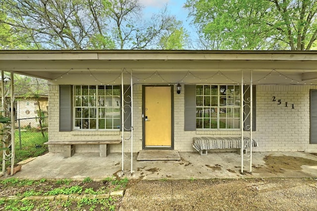 2511 Bitter Creek Dr, Austin, TX 78744 - view of exterior entry with brick siding