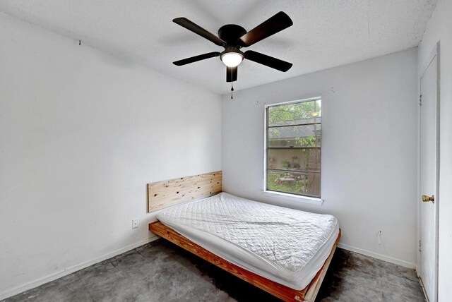 2511 Bitter Creek Dr, Austin, TX 78744 - bedroom featuring baseboards and ceiling fan
